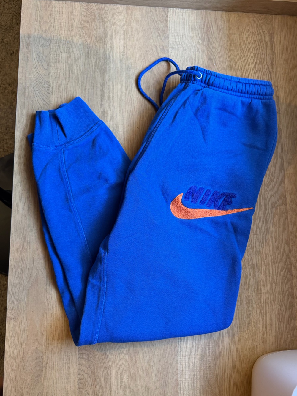 Nike Royal Blue Sweatpants with Orange Swoosh Logo